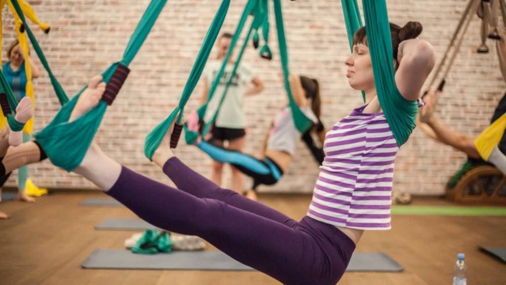 Воздушная йога в гамаках – чем полезна, упражнения для детей, беременных, похудения